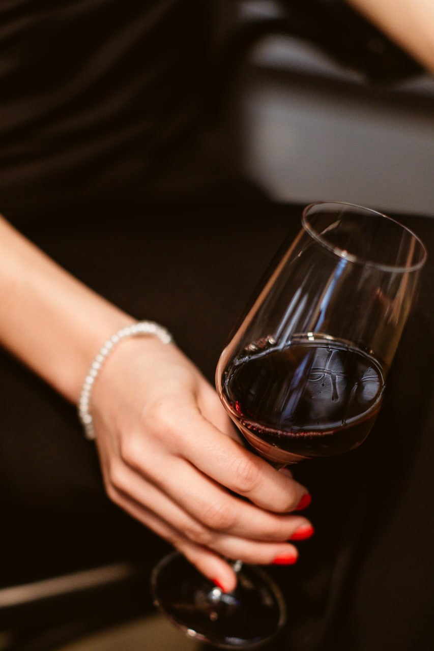 sommelier leading wine tasting event in elegant venue